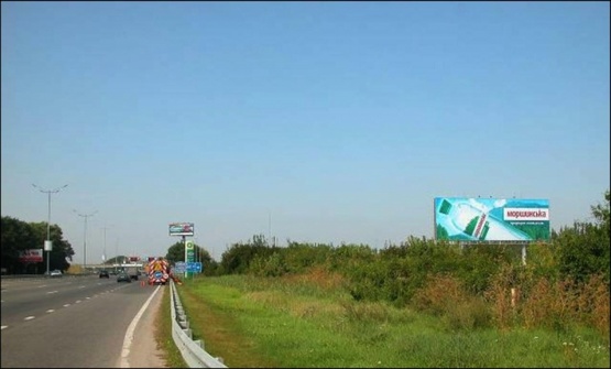 Фото рекламної площини за адресою 31 км автодорога Киев - Харьков - Довжанский (расположен в 20м от АЗС British Petroleum)