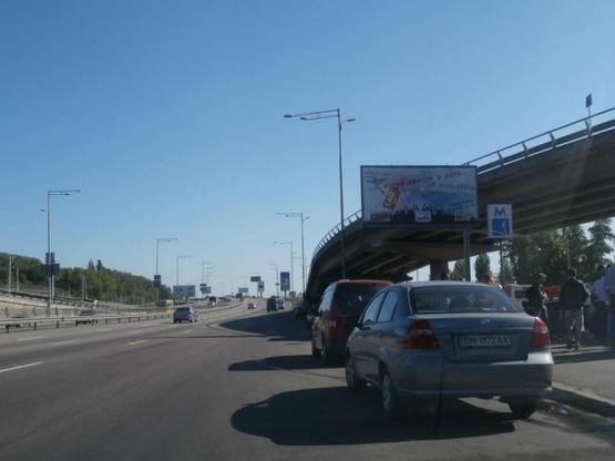 Фото рекламної площини за адресою Надднепрянское шоссе, М"Выдубичи" (по ходу к мосту Патона)