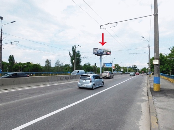 Фото рекламной плоскости по адресу Фрунзе ул., возле ул.Телиги Елены, Куреневского парка, в сторону Петровки