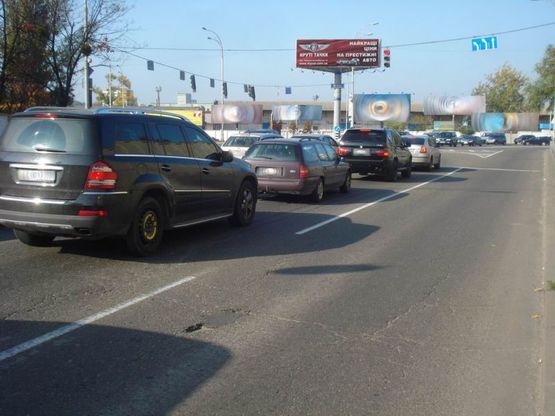 Фото рекламної площини за адресою Межигорская ул.89, перекресток с ул.Заводской