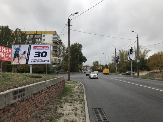 Фото рекламної площини за адресою Набережная Победы ул., - Добровольцев ул. (АЗС "Юкон", спорт-бар "Beer winner"), в направл. бул. Славы