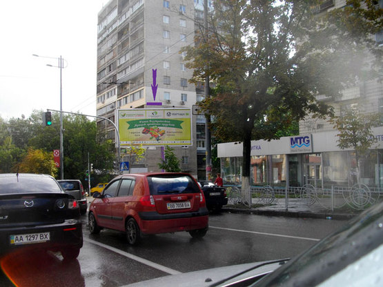 Фото рекламной плоскости по адресу ул. Урицкого, 25 / ул. Стадионная(на светофоре)