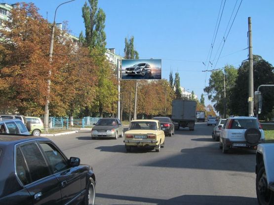 Фото рекламной плоскости по адресу Валентиновская ул., 38а - Тракторостроителей пр-т, из центра Фото рекламной плоскости по адресу Валентиновская ул., 38а - Тракторостроителей пр-т, из центра