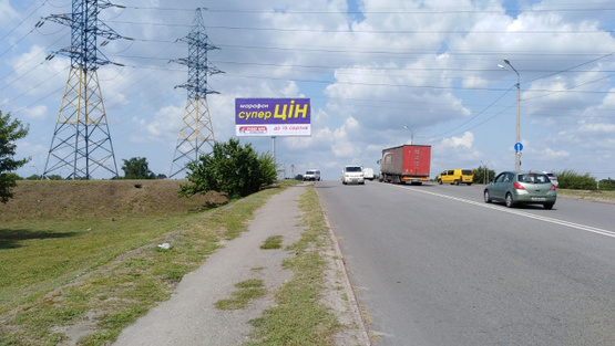 Фото рекламной плоскости по адресу Передовая ул. - Донецкое шоссе (перед мостом), АЗС "Авиас", в направл. из центра города