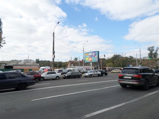 Фото рекламной плоскости по адресу Скляренко ул. (Куренёвский рынок, супермаркет Сильпо, в направлении ул. Автозаводской)