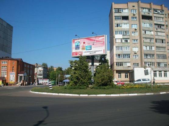 Фото рекламної площини за адресою ул. Декабристов 1-А, перекресток с ул.Грушевского , клумба, со стороны ул.Грушевского