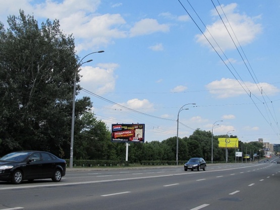 Фото рекламної площини за адресою Лобановского Валерия просп. (Краснозвездный просп.) (300м до ул. Кировоградская), АЗС "WOG", Совские пруды, ресторан "Нарния", направ. Московской пл.