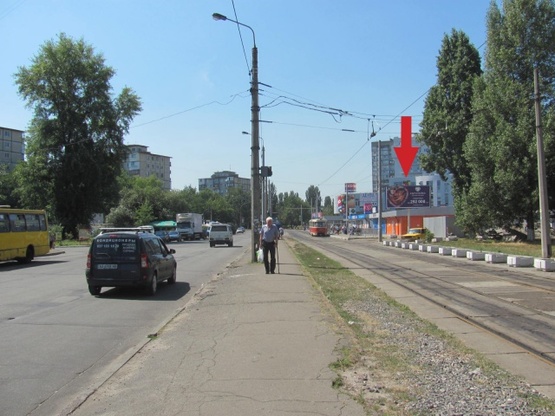 Фото рекламної площини за адресою Кибальчича ул., 15, рынок Десна, (Технополис, маркет "Фуршет", "Фора", ПравексБанк, УкрСоцБанк, "Космо"), направ. бул. Перова