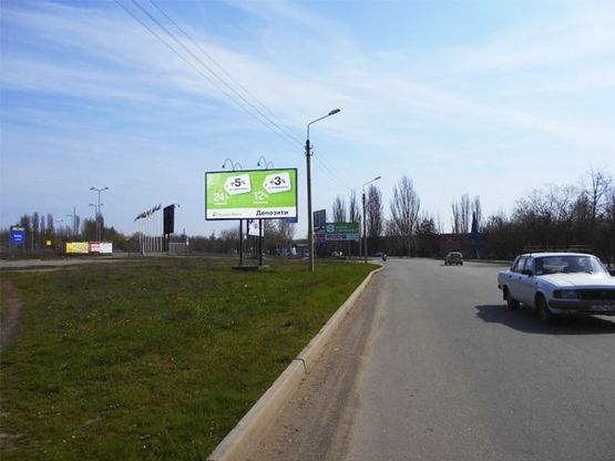 Фото рекламної площини за адресою Быкова ул.,  въезд  в "МЕТРО"