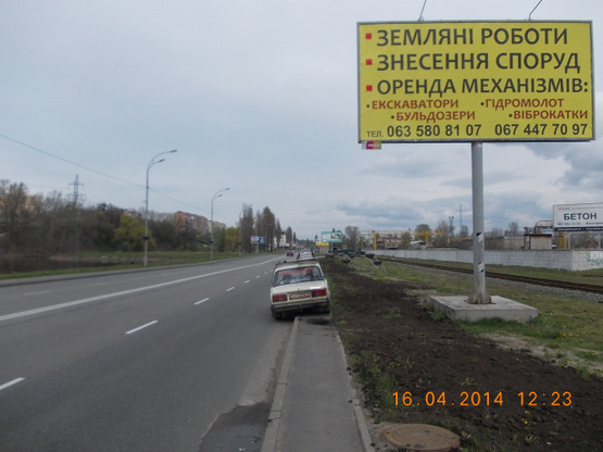 Фото рекламной плоскости по адресу Набережная, на стороне жд дороги ,3-й от светофора, 250 м перед поворотом на проспект Шевченко направление Хотяновка