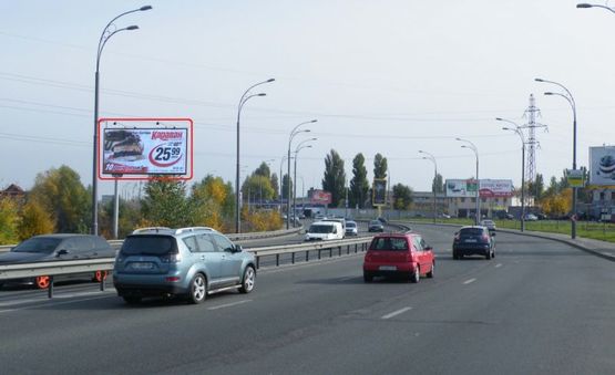 Фото рекламної площини за адресою Набережно-Рыбальская, напротив АЗС, напр. от Оболони