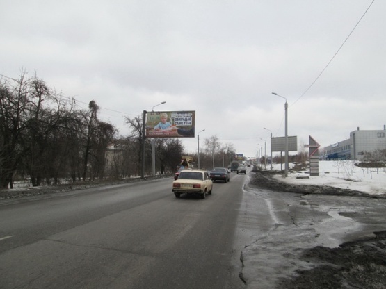 Фото рекламной плоскости по адресу Мерефянское шоссе 16( ТЦ "Комфорт", АТЛ) в напр. просп.Л.Ландау
