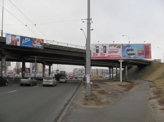 Фото рекламной плоскости по адресу Тульская пл., (АЗС "ТНК", ТЦ "Макрос" в сторону ул. О.Телиги), призма