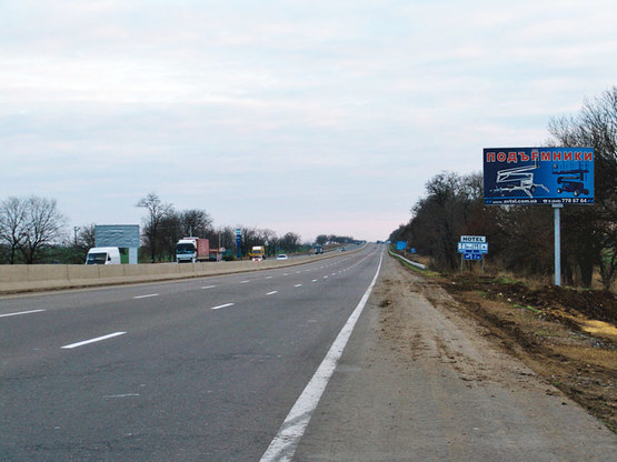 Фото рекламної площини за адресою Киев-Одесса.До Клеверного моста по направлению из Киева (456 + 800), 12,5 км до въезда Фото рекламної площини за адресою Киев-Одесса.До Клеверного моста по направлению из Киева (456 + 800), 12,5 км до въезда