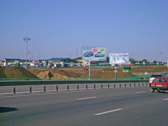 Фото рекламной плоскости по адресу Овидиопольская дорога -  промрынок "7км",  от "Эпицентра", из города