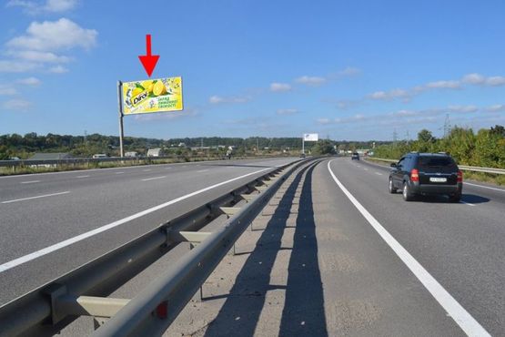 Фото рекламной плоскости по адресу Эстакада2-пос.Песочин-выезд из города в ст.трассы Киев-Харьков-Довжанский