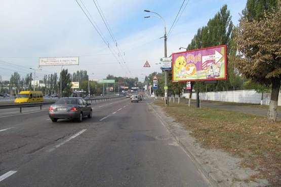 Фото рекламної площини за адресою Лугова вул., №2 навпроти ТЦ "Караван" (в напр. вул.Автозаводської)