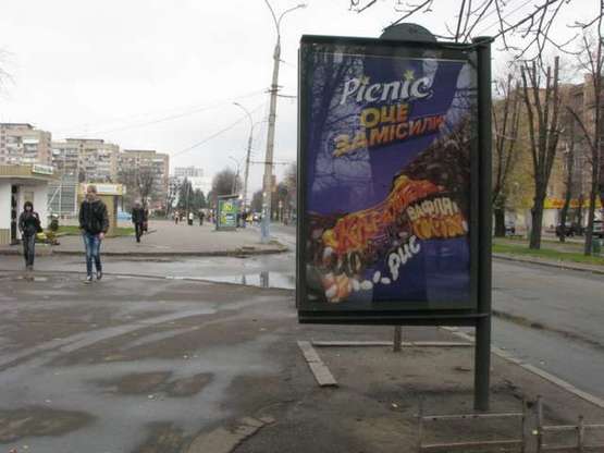 Фото рекламної площини за адресою Шевченка бульв., 242 - Симоненко вул.