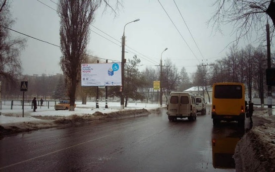 Фото рекламної площини за адресою Кондратьева Герасима ул. (Кирова ул) - Гамалия ул. (Пиццерия "Venecia", Храм Иоанна Русского, Афганский сквер, ОщадБанк), в направл. центра города