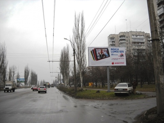 Фото рекламної площини за адресою 30-летия Победы ул., 40 (гипер-маркет "Эпицентр", маркет "Фокстрот", "АТБ", "Fresh Market", автосервис), направл. Кольцо Рустави