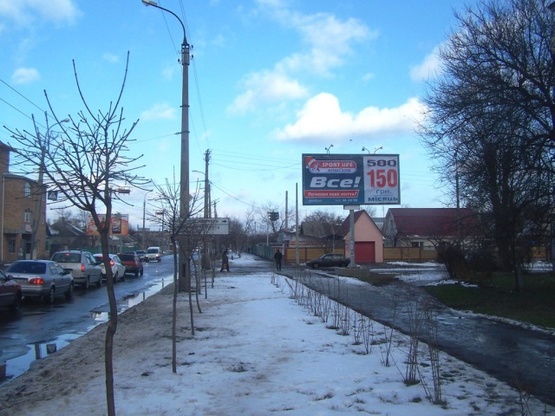 Фото рекламної площини за адресою Вячеслава Черновола  (Энгельса) ул. - Чайковского ул.(перекресток), (Продуктовый и Вещевой рынки, СТО, кафе "VEST"), в направл.к бул.Шевченко