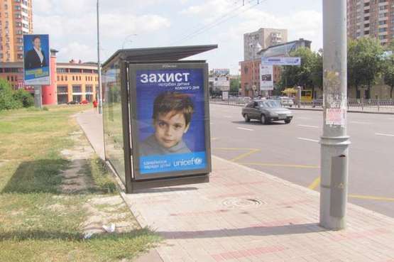 Фото рекламної площини за адресою Лесі Українки бульв., 21-А - Українки Лесі пл., __зупинка громадського транспорту