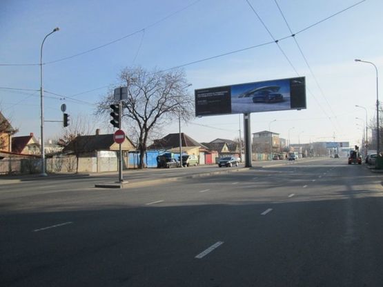 Фото рекламной плоскости по адресу ул. Щорса - ул. Корнюшина (левая в город)