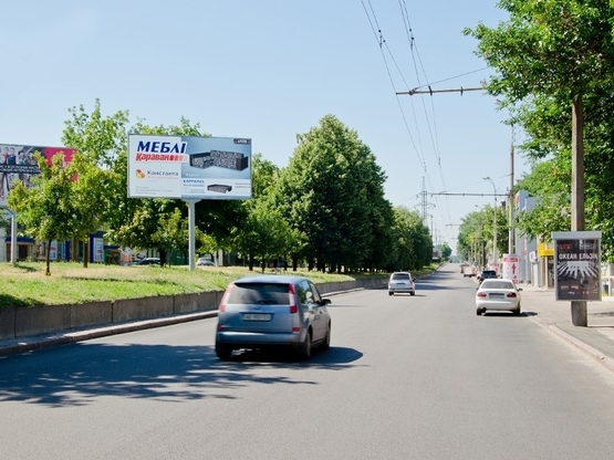 Фото рекламной плоскости по адресу пр. Александра Поля, 56, движение к ул. Титова. Центральный р-н. Фото рекламной плоскости по адресу пр. Александра Поля, 56, движение к ул. Титова. Центральный р-н.