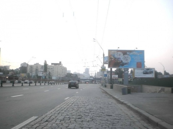 Фото рекламной плоскости по адресу Победы проспект,  за трол. остановка "Центральный  ЗАГС "