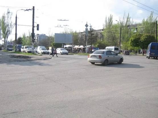 Фото рекламної площини за адресою 063_Парамонова д 10 / ул Комарова   (по дороге на пески)