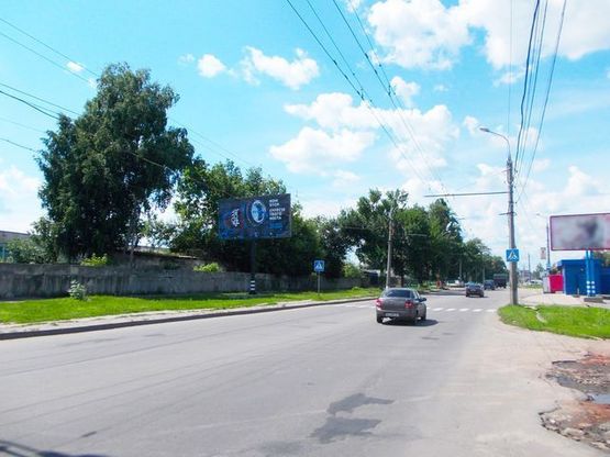 Фото рекламної площини за адресою Белопольское шоссе ул. , 13 -  автосалон Фольксваген Фото рекламної площини за адресою Белопольское шоссе ул. , 13 -  автосалон Фольксваген