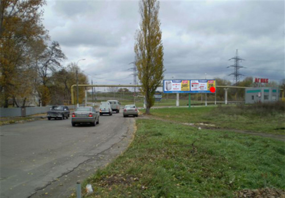 Фото рекламної площини за адресою Набережная ул., выезд на мост