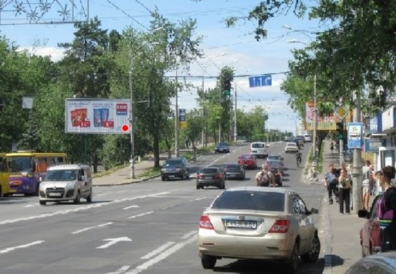 Фото рекламной плоскости по адресу Строителей ул. - Попудренко ул.
