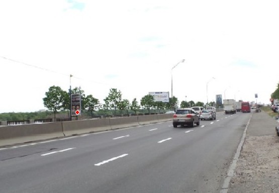 Фото рекламної площини за адресою Набережное шоссе (эл. опора № 25-26)