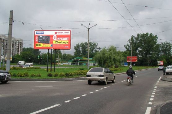 Фото рекламної площини за адресою Вячеслава Чорновола просп. - Варшавська вул. (від центру) Фото рекламної площини за адресою Вячеслава Чорновола просп. - Варшавська вул. (від центру)