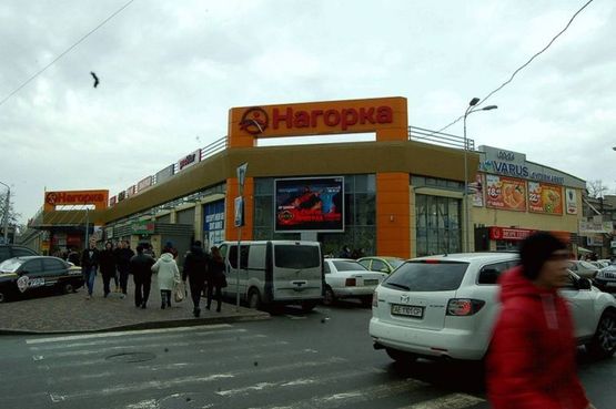 Фото рекламной плоскости по адресу угол пр.Гагарина и ул.Чернышевского, ТЦ Нагорка Фото рекламной плоскости по адресу угол пр.Гагарина и ул.Чернышевского, ТЦ Нагорка