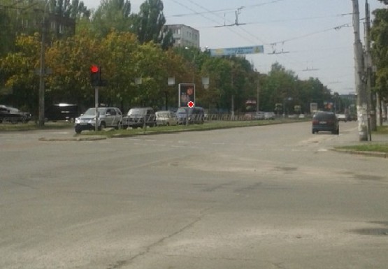 Фото рекламной плоскости по адресу Рокоссовского ул. - Доценка ул., кафе Сан-Сити