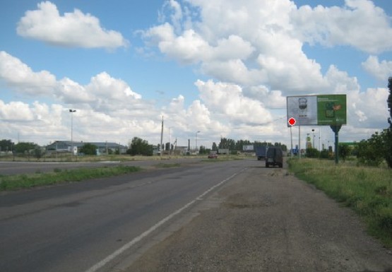 Фото рекламной плоскости по адресу Киевская трасса - въезд  4