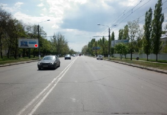 Фото рекламной плоскости по адресу Героев Сталинграда пр., 67  -  за Школьной ул.