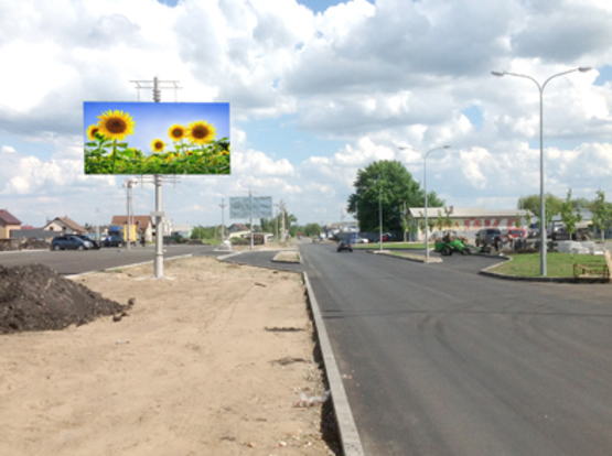 Фото рекламной плоскости по адресу ул. Депутатская, въезд с трассы, напротив Варшавского рынка