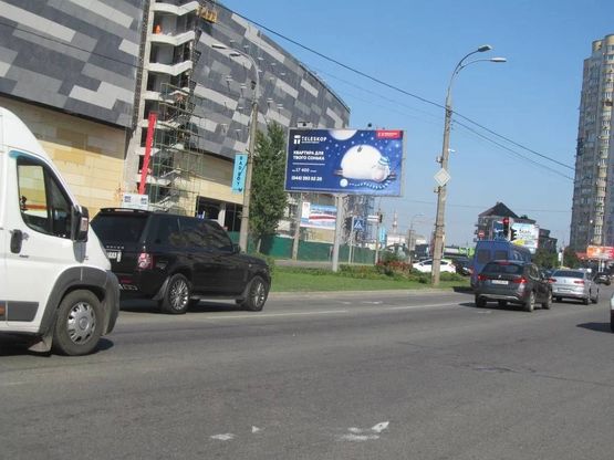 Фото рекламной плоскости по адресу Дніпровська набережна/ вул. А.Ахматової на розподільчій смузі  (3,15х6,15) Фото рекламной плоскости по адресу Дніпровська набережна/ вул. А.Ахматової на розподільчій смузі  (3,15х6,15)