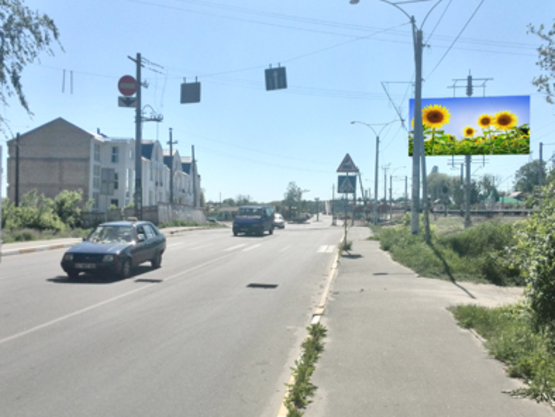 Фото рекламной плоскости по адресу ул. Вокзальная, возле переезда