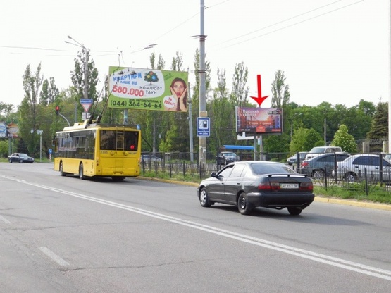 Фото рекламної площини за адресою Народного Ополчения ул., со стороны ул.Эрнста, в центр