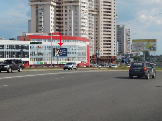 Фото рекламной плоскости по адресу Григоренка Петра пр-т, напротив ТЦ Пирамида, треугольник, из центра