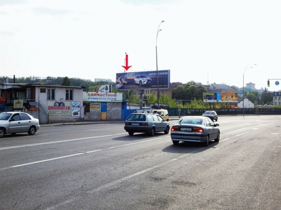 Фото рекламной плоскости по адресу Набережно-Луговая ул., возле ул.Межигорская, у СТО, из центра, левая