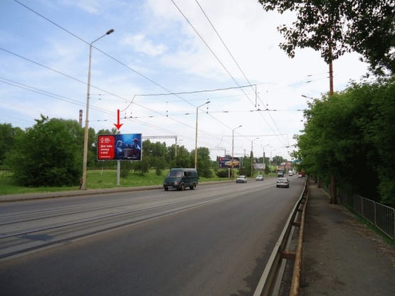 Фото рекламної площини за адресою Мануйловский пр-т, въезд на Амурский мост, из центра