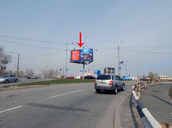 Фото рекламної площини за адресою Луговая ул., Богатырская ул., возле ТЦ Караван, развязка со стороны ул.Богатырской Фото рекламної площини за адресою Луговая ул., Богатырская ул., возле ТЦ Караван, развязка со стороны ул.Богатырской