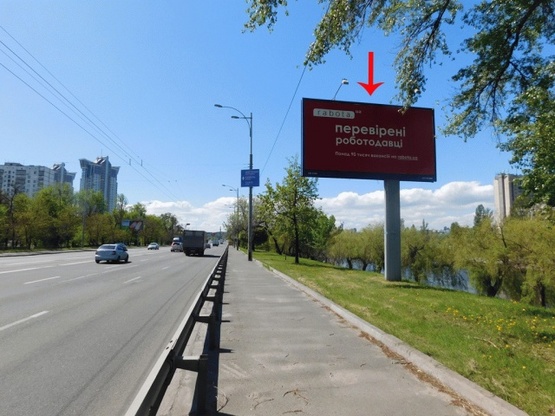 Фото рекламной плоскости по адресу Воссоединения пр-т, 3-й  от моста Патона, ж/м Русановка, в центр