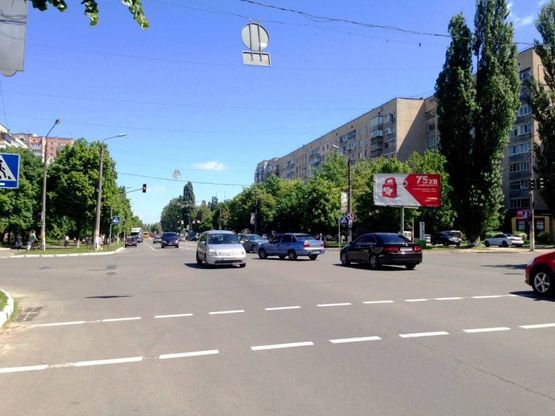 Фото рекламной плоскости по адресу м.Бровари, бул. Незалежності, 12, перетин з вул.Короленко Фото рекламной плоскости по адресу м.Бровари, бул. Незалежності, 12, перетин з вул.Короленко