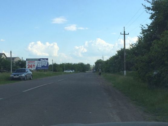 Фото рекламной плоскости по адресу ул. Ленина - въезд от  Теплика Фото рекламной плоскости по адресу ул. Ленина - въезд от  Теплика